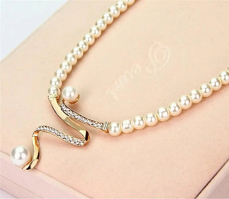Set collana e orecchini con perle naturelles