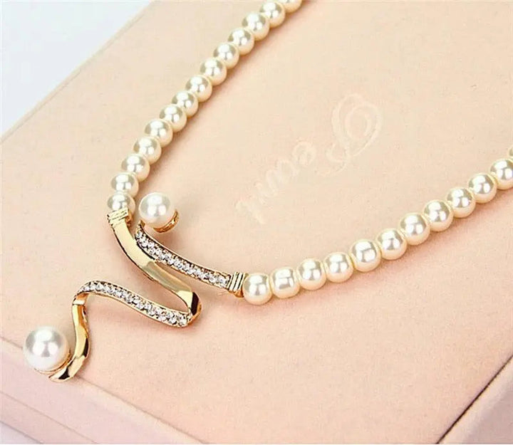 Set collana e orecchini con perle naturelles