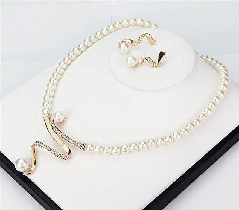Set collana e orecchini con perle naturelles