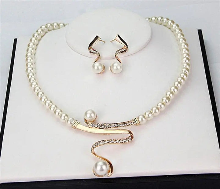 Set collana e orecchini con perle naturelles