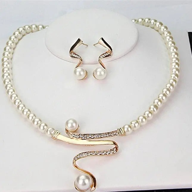 Set collana e orecchini con perle naturelles