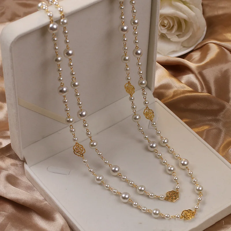 Collana elegante in or con perle
